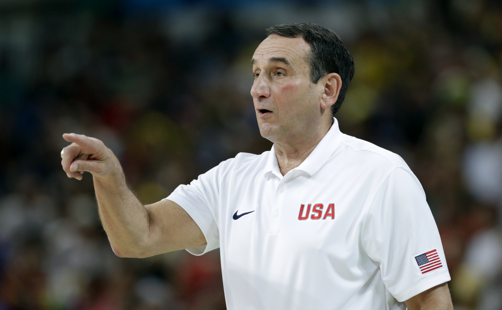 Mike Krzyzewski directs his team during a basketball game against France in Brazil.