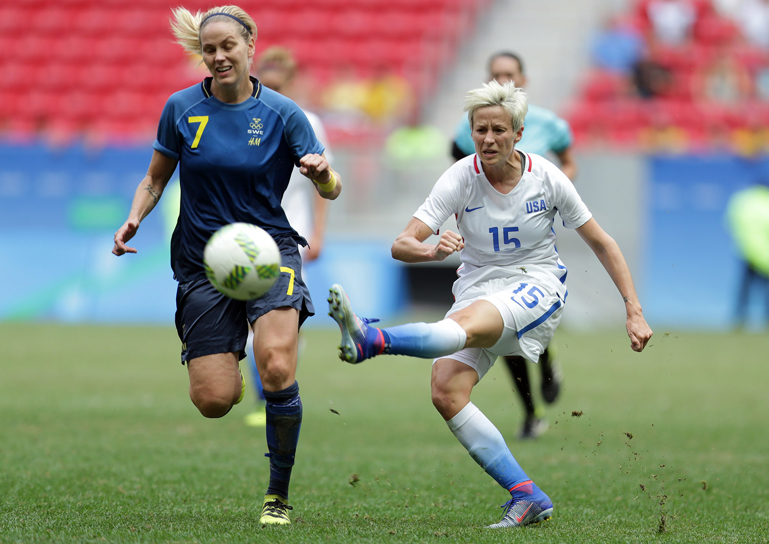 United States' Megan Rapinoe kicks the ball past Sweden's Lisa Dahlkvist during a quarterfinal Olympic soccer match in Brasilia on Friday. The United States lost in a shootout.