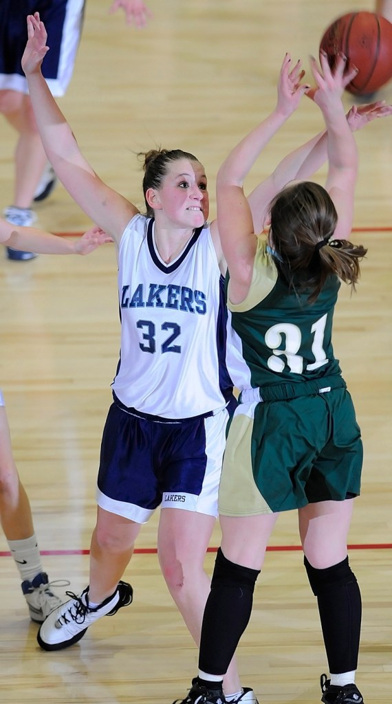 Greenville's Saige Weeks blocks a shot by Allison Hammond.