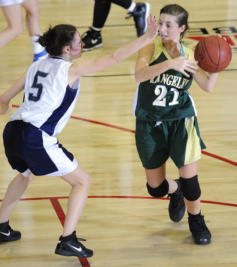 Carli Peat of Greenville defends Rangeley's Chantal Carrier.