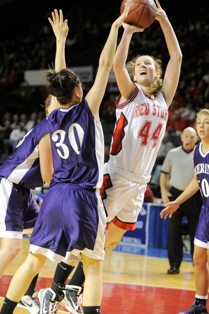 Scarborough's Christy Manning shoots over Aarika Viola.