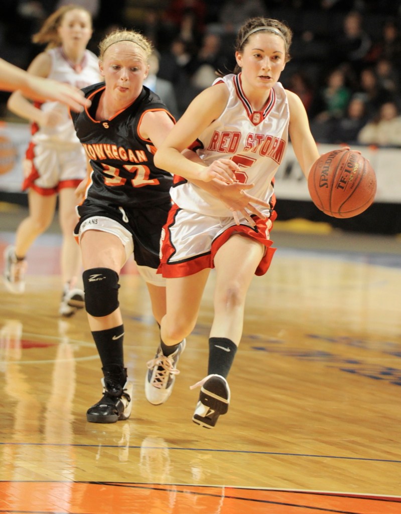 Scarborough point guard Brittany Ross races up court with Whitney Jones in pursuit.