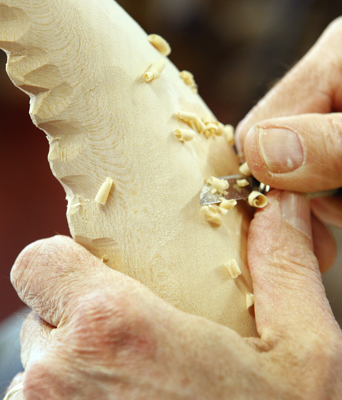 Wayne Robbins has carved more than 3,650 whales and endured “a lot of blisters and cuts along the way.”