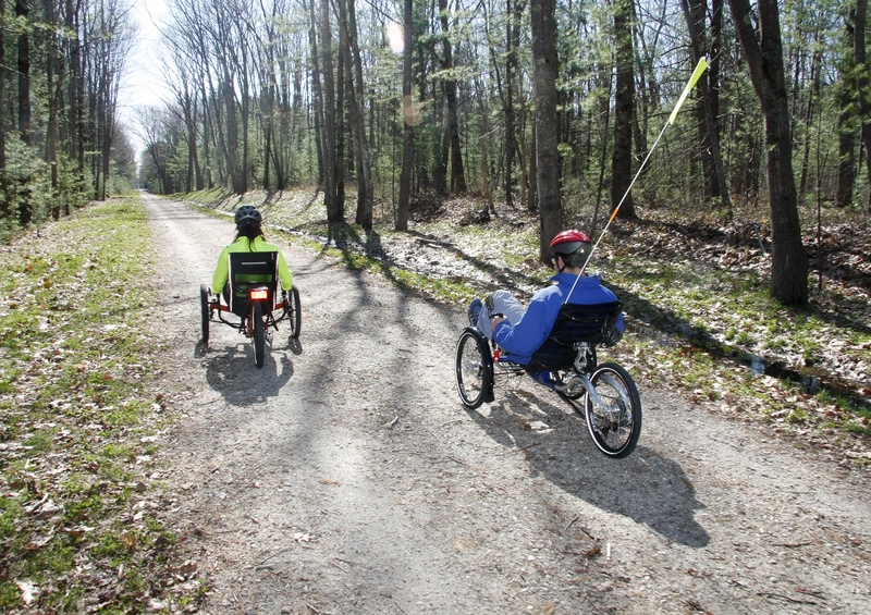 Ethan Davis of Wildfire Human Powered Vehicles takes Outdoors reporter Deirdre Fleming for a spin on a recumbent tricycle near Scarborough Marsh. Of recumbents, Davis says: “The biggest reason people want them is comfort. ... The biggest question people have is how safe it is in traffic.”