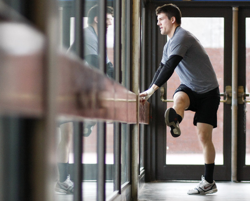 Not long before fans enter the Cumberland County Civic Center concourse for a Portland Pirates game, Kyle Rank is one of the players doing his stretching – a routine that he and other players are sure to follow. Game after game.