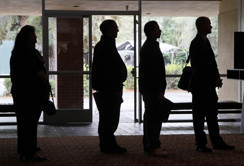 Job seekers await the start of a San Jose, Calif., career fair. Some of the people now receiving welfare may have been laid off and still have "a car and clothing left over from their more prosperous days," a reader writes.