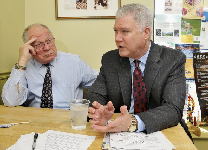 John Richardson, right, sitting with attorney and friend F. Lee Bailey at Wild Oats Bakery and Cafe in Brunswick on Monday, discusses what led up to his being denied Clean Election money.