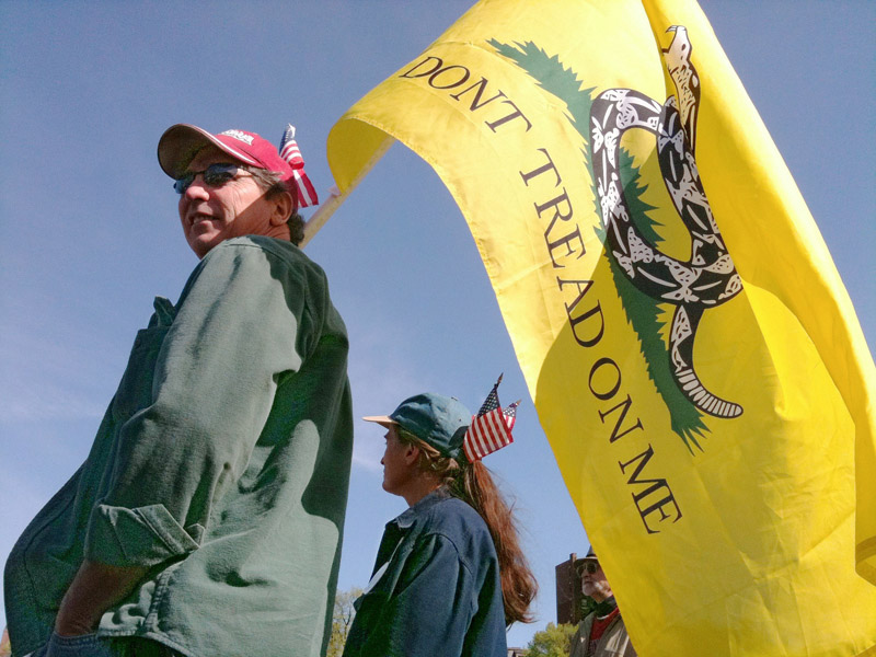 Gregory Rec/Staff Photographer: Tom and Debbie Barry of Lisbon Falls wait for the start of the Tea Party rally at the Boston Common on Wednesday, April 14, 2010.