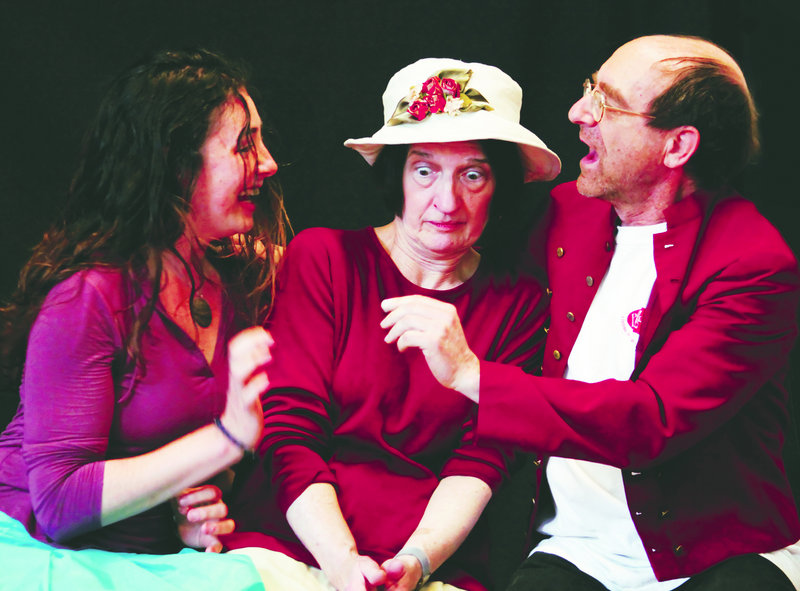 Julia Reddy, left, Maggie Gish and Seth Berner act out a scene in “As You Like It.”