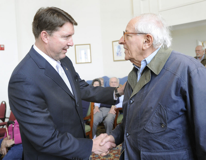 GOP gubernatorial candidate Matt Jacobson meets resident Donald Shire on a visit to Piper Shores retirement community in Scarborough.