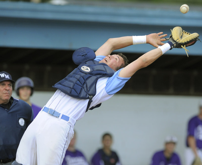 Westbrook catcher Tom Lemay leans back to catch a foul ball hit by Deering’s Nick Colucci in the fourth inning of Thursday’s game at Olmsted Field. The Blue Blazes won, 9-6.