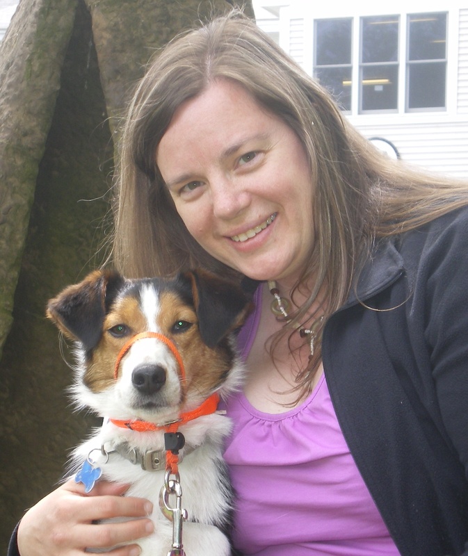 Deborah Baker, a recent graduate of NEADS, poses with her hearing dog, Rusty, who has provided her with a new found sense of freedom.