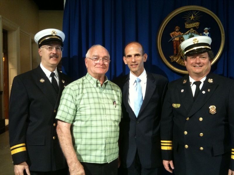 Taking part in a Heart Safe ceremony are, from left, Tony Attardo, deputy chief of the Scarborough Fire Department; Jim Merry; Gov. John Baldacci, and B. Michael Thurlow, chief of the Scarborough Fire Department.