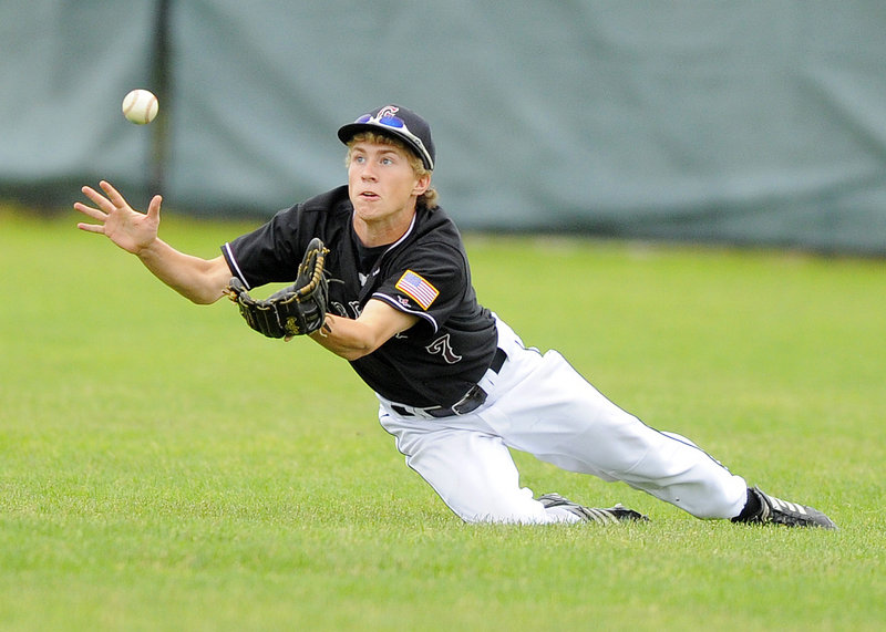 Greely outfielder Matti Ingraham dives for the ball Saturday in a Western Class B semifinal at Cape Elizabeth. Ingraham couldn't make the catch but recovered in time to get a forceout at third baseman. Cape Elizabeth advanced, however, with a 4-3 win.