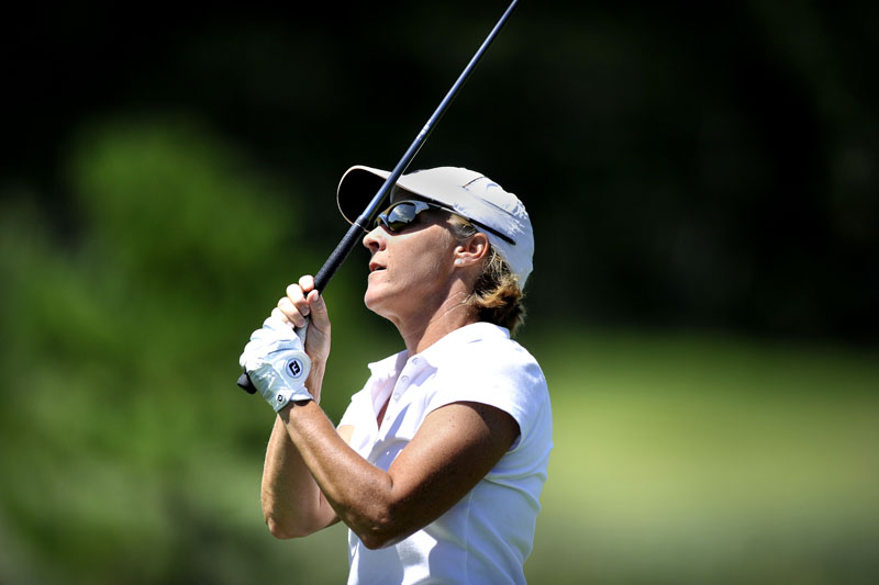 Kristin Kannegieser, who plays out of Martindale Country Club in Auburn, follows the flight of a drive Tuesday during the second round of the Women’s Maine State Golf Association Championship. Kannegieser shot a 77 and will take a two-stroke lead into the final round today.