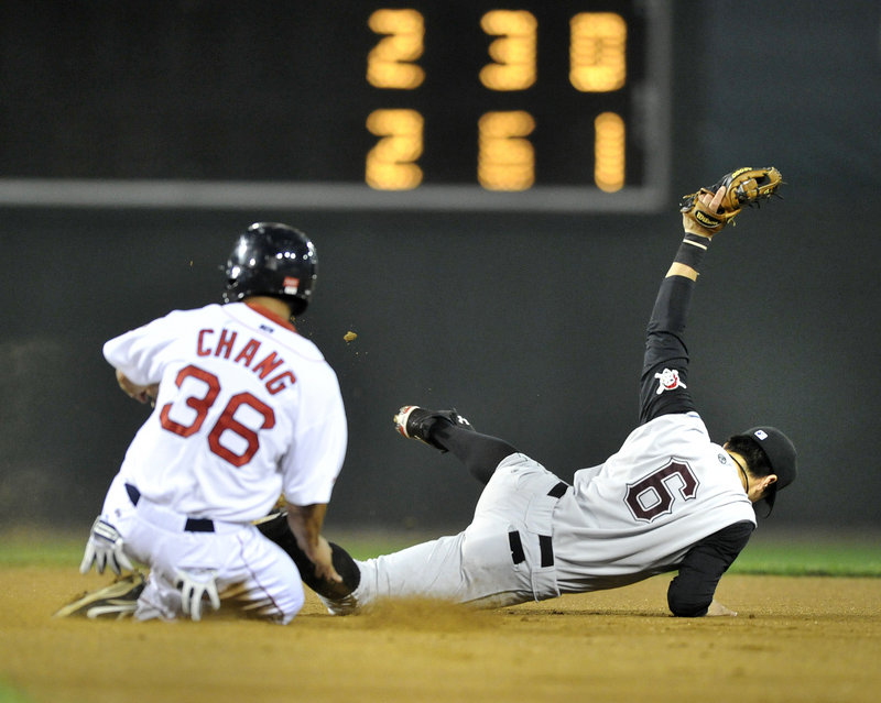 Second baseman Chase d'Arnaud of the Altoona Curve shows the ball after coming up with an errant throw Tuesday night to force Ray Chang of the Portland Sea Dogs in the fourth inning. Altoona won 4-2 at Hadlock Field.