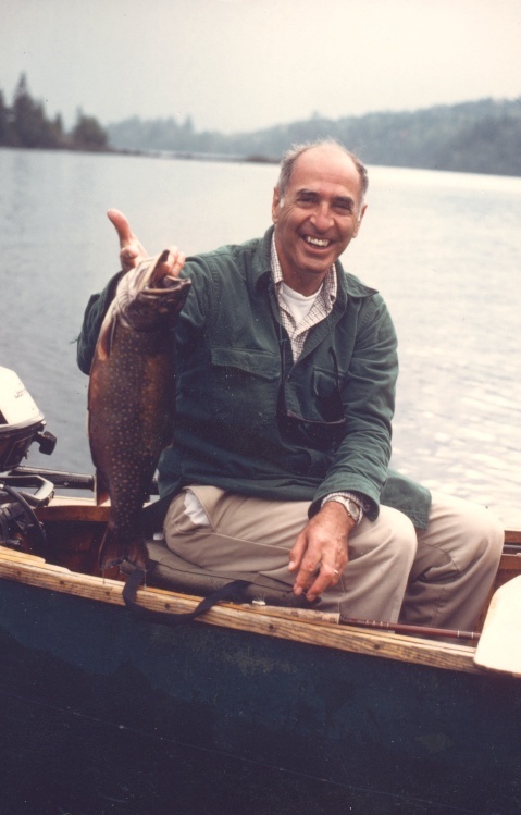 Dr. Ferris Ray holds a 4-pound, 8-ounce trout he caught on a fly-fishing excursion at Pierce Pond in north New Portland, his favorite spot to fly fish.