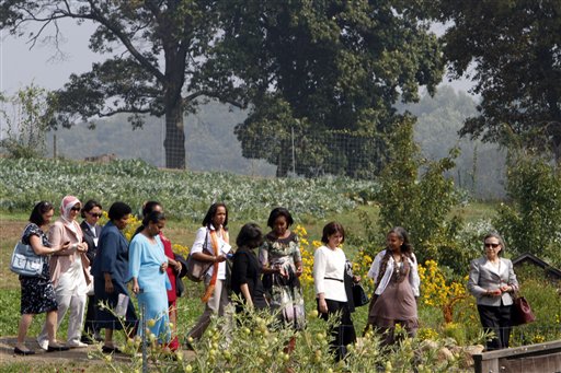 U.S. First lady Michelle Obama, center, walks with spouses of chiefs of state attending the U.N. General Assembly at the farm on Friday.