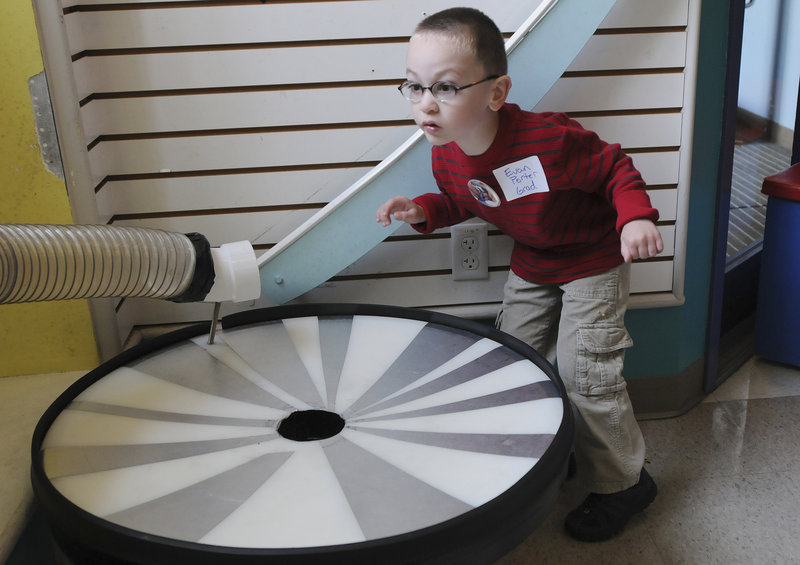 Evan Porter, 5, of China plays at the NICU reunion Sunday in Portland. Evan, born at 25 weeks and weighing 1 pound, 14 ounces, spent three and a half months in the NICU at Maine Med.