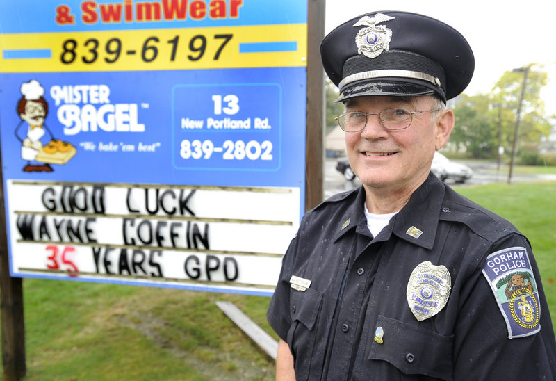 Many Gorham businesses, including Mr. Bagel, have put up signs congratulating Wayne Coffin on his retirement.