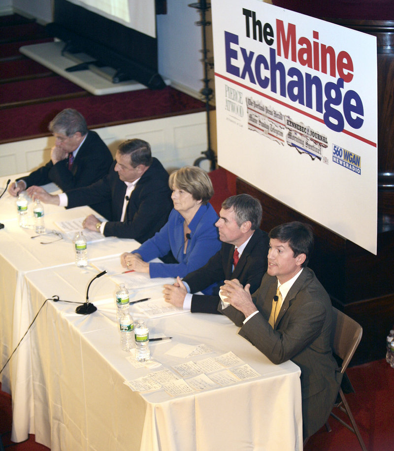 Kevin Scott answers a question Saturday night during The Maine Exchange gubernatorial debate at the First Parish Unitarian Church in Portland. Candidates stuck with familiar themes a little more than a week before Election Day.