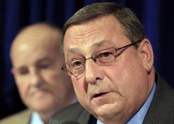 Gov.-elect Paul LePage, right, announces members of his budget team at a State House news conference in Augusta on Tuesday. Sawin Millett, left, is a co-leader of LePage's budget advisers.