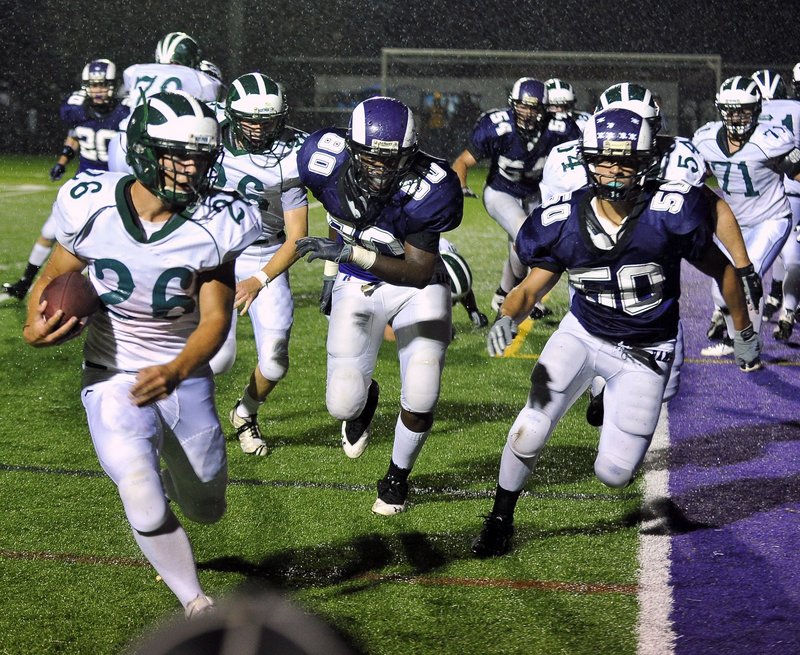 Ethan Thorne, running for a touchdown against Deering in September, is part of the spread offense that has helped Bonny Eagle turn its program into an annual contender. The Scots look to run first, then pass.