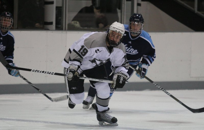 Derek Army, foreground, grew up in Scarborough when his father, Tim, coached the Portland Pirates. Derek Army now is a freshman at Providence College, where his father and grandfather played.