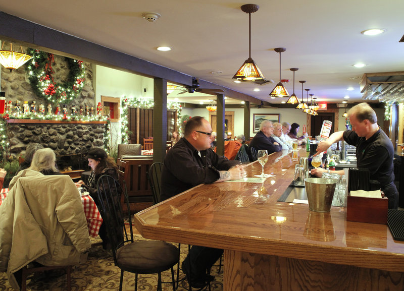 Oak Street’s massive stone fireplace is reminiscent of ski lodges and old-school hunting camps.