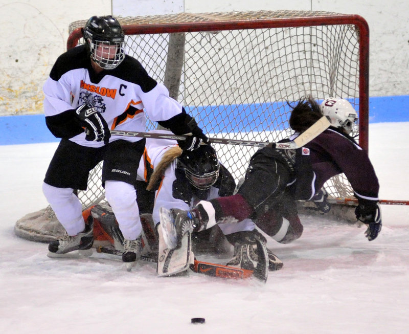 Etta Copenhagen of Greely heads to the ice in front of the Winslow net in the second period. Greely will take on top-ranked St. Dominic for the Eastern title Wednesday.