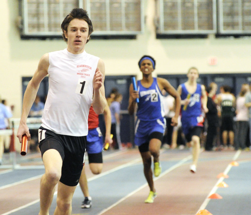 Nick Morris leads off the 3,200 relay for Scarborough, which won the race in 8 minutes, 17.98 seconds.