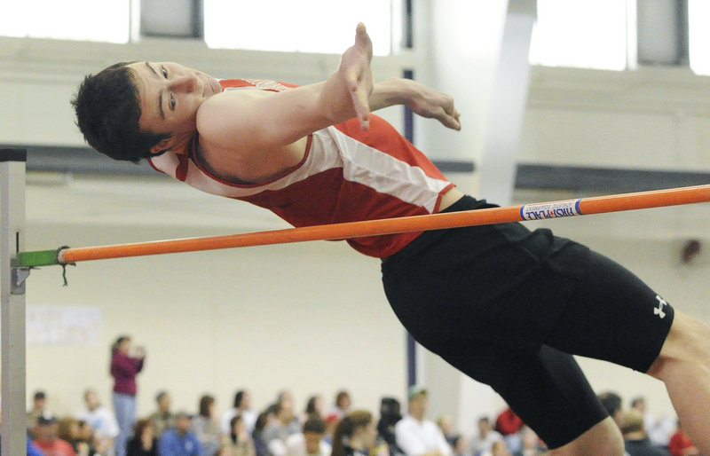 Orin James of Scarborough clears 6 feet, 2 inches to win the high jump during the Class A state meet at the University of Southern Maine. James also finished second in the 55 hurdles and was sixth in the pole vault for the Red Storm, who won the boys and girls titles.