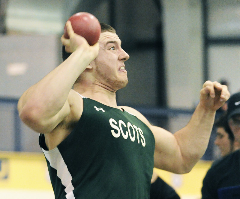 John Patriquin/Staff Photographer Nate Martel of Bonny Eagle heaves the shot put during the Class A indoor track meet Monday in Gorham. Martel’s best throw of 48 feet, 9 3/4 inches was enough to win the state title.