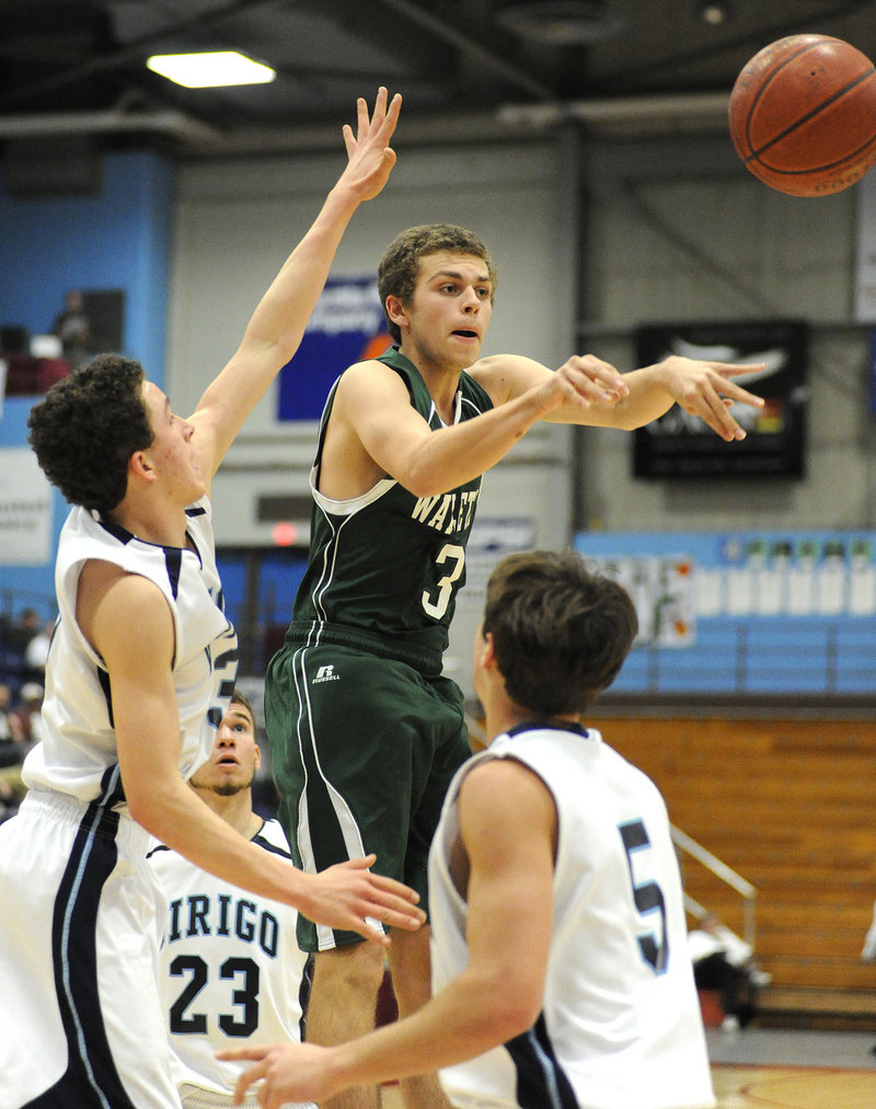 Max Belleau of Waynflete spots a teammate as a crowd of Dirigo defenders closes in during Dirigo’s 55-37 win in a Western Class C semifinal at Augusta.