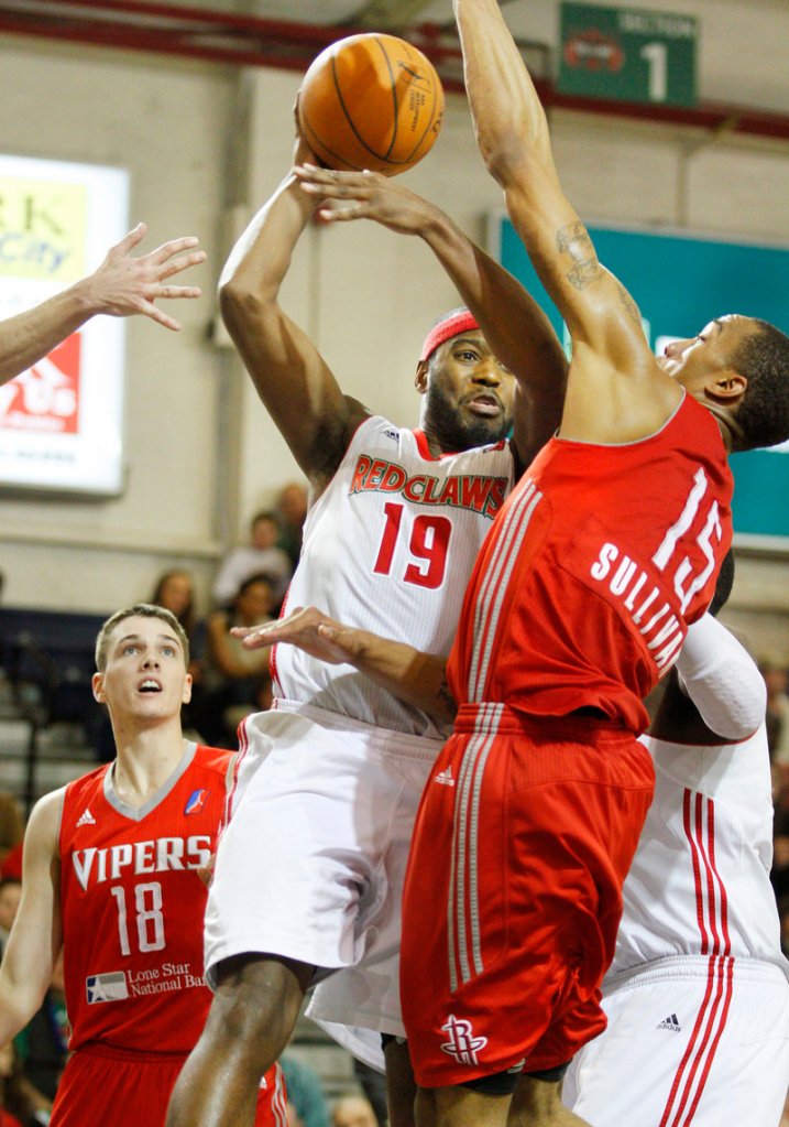 Maine's Mario West, left, looks for an outlet pass as Rio Grande Valley's Patrick Sullivan defends. West had 12 points for the Claws. Sullivan had 21 for the Vipers.