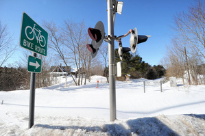 Old railroad lights sit idle where the Sebago to the Sea Trail ends for now in South Windham.