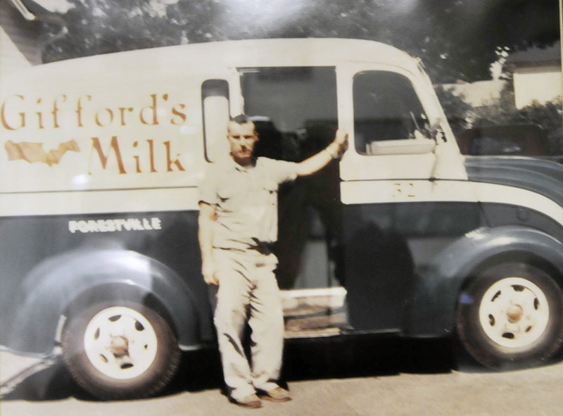 A family photo showing Randall Gifford Jr. circa 1960 with a milk truck in Forestville, Conn., hangs on a wall at Gifford’s Ice Cream in Skowhegan. He moved to Maine when he bought Titcomb’s Dairy in Farmington on the early 1970s.