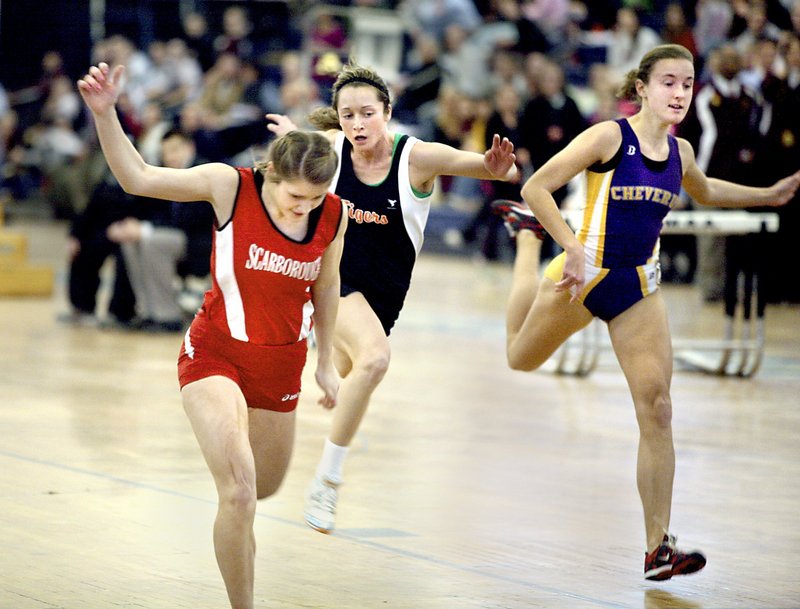 Nicole Kirk, left, of Scarborough says she benefited as a sprinter from running cross country in the fall and practicing with stronger, faster runners on the boys' team this winter.