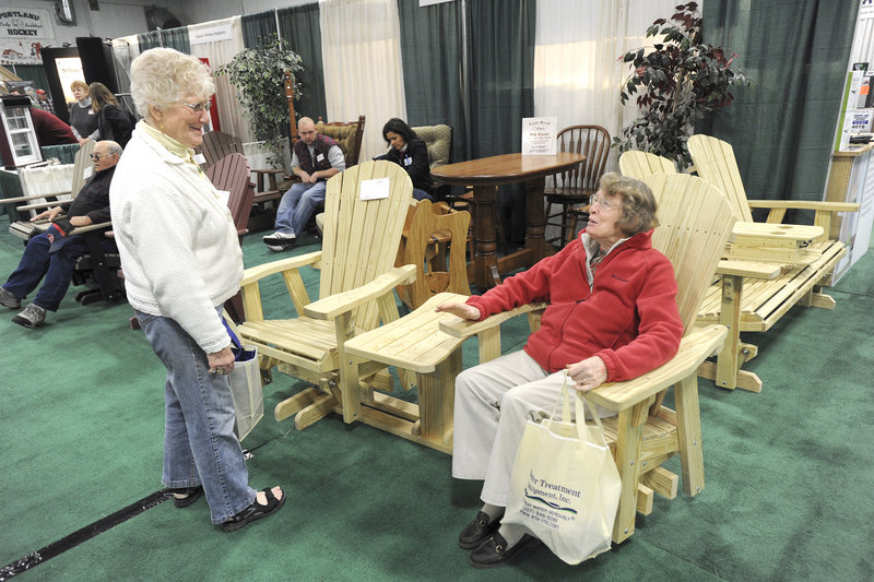 Anita Holmquist of Raymond and her sister Margo Jones of Beverly, Mass., check out chairs Saturday at the 42nd annual Portland Home Show at the Portland Expo and Portland Ice Arena. The show continues from 10 a.m. to 5 p.m. today.