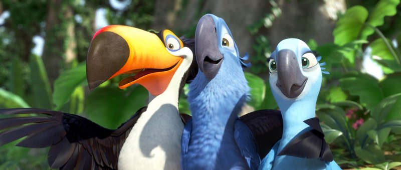 Rafael the Toucan (voiced by George Lopez), Blu (Jesse Eisenberg) and Jewel (Anne Hathaway) in "Rio."