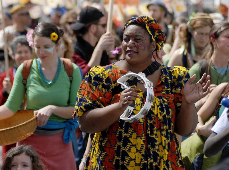 Revelers participate in 2009’s celebration of Ebune. You can craft your own parade masks at one of a couple of upcoming workshops or borrow some in front of MECA before the procession kicks off on Sunday.