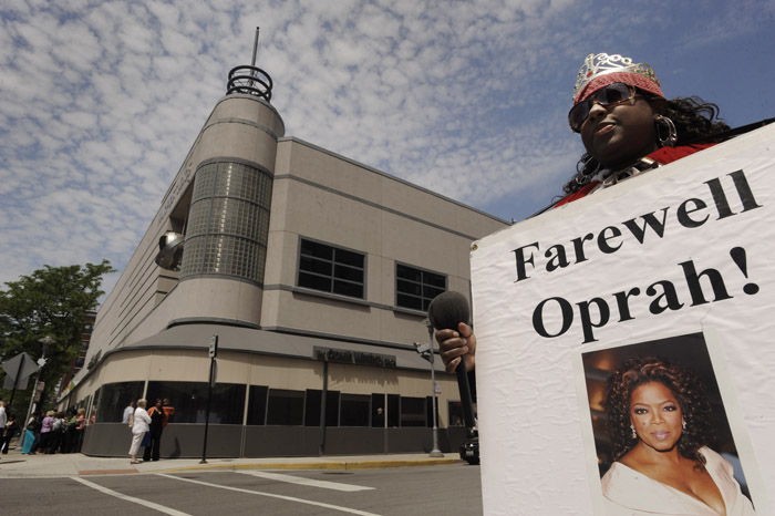 Kimberly Adams waits outside Harpo Studios before the final taping of "The Oprah Winfrey Show" in Chicago.