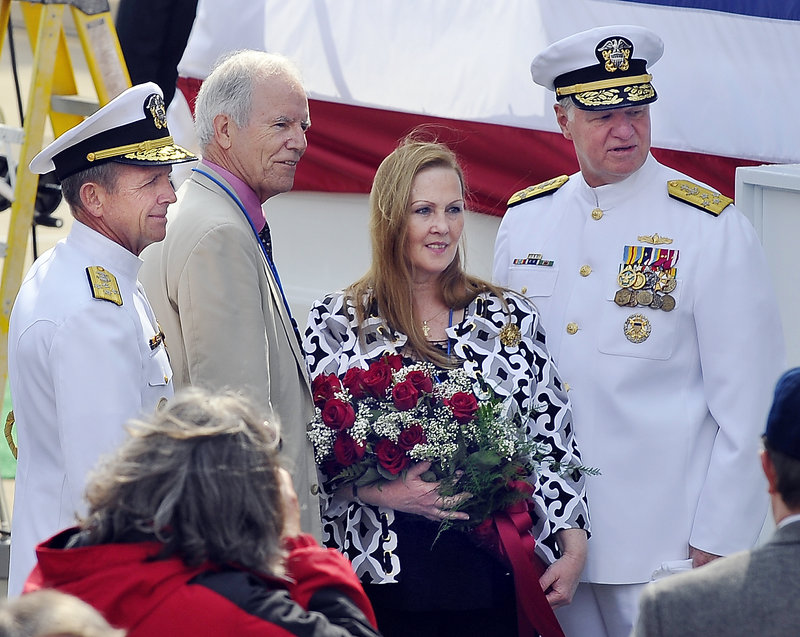 Lt. Michael Murphy’s parents, Dan and Maureen Murphy, pose with Adm. Eric T. Olson, left, commander of U.S. special operations, and Adm. Gary Roughead, chief of naval operations.