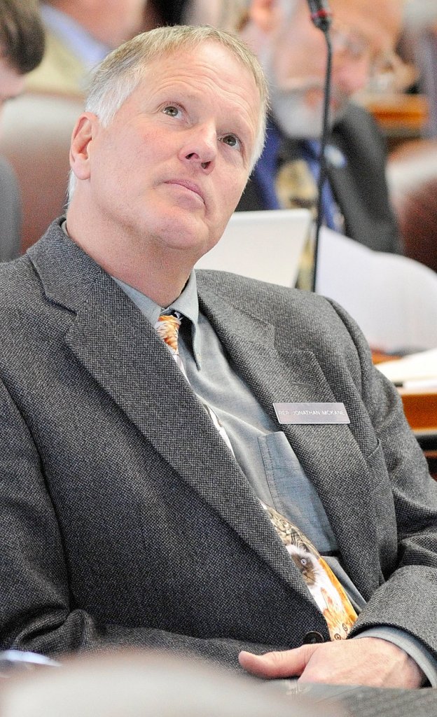 Rep. Jonathan B. McKane, R-Newcastle, watches the tally board in the House chamber Tuesday as L.D. 1333 is sent to the Senate, which will take it up today.