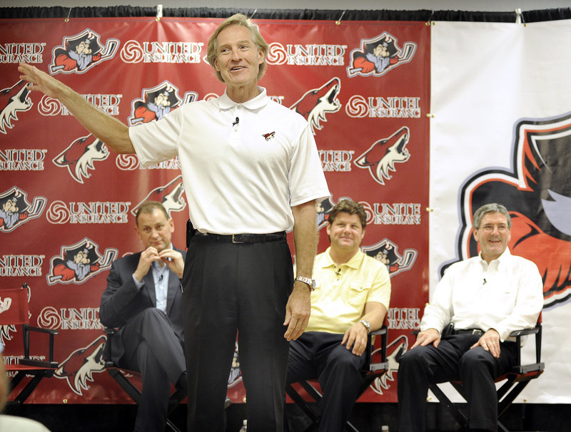 John Patriquin/Staff Photographer Don Maloney, the Phoenix Coyotes GM, introduced himself Thursday to Portland, along with the Pirates new GM, Brad Treliving, left, and Coach Ray Edwards.