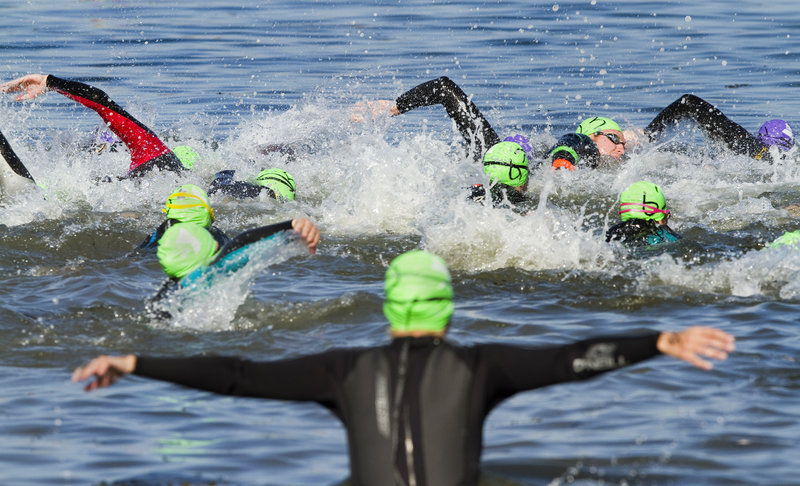 And off they go, leaving Peaks Island for the blue waters of Casco Bay, with East End Beach in Portland as the destination Saturday in the 30th annual Peaks to Portland Swim.