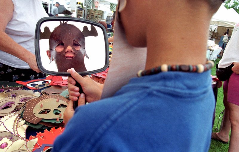 A fairgoer models a moose mask at a craft table during a York Days of yore. This year’s York Days and accompanying festivities – Christmas in July and the Lighting of the Nubble – start Saturday and run through Aug. 7. Visit tinyurl.com/yorkdays for a schedule of activities, which include concerts, tournaments and sandcastle building.