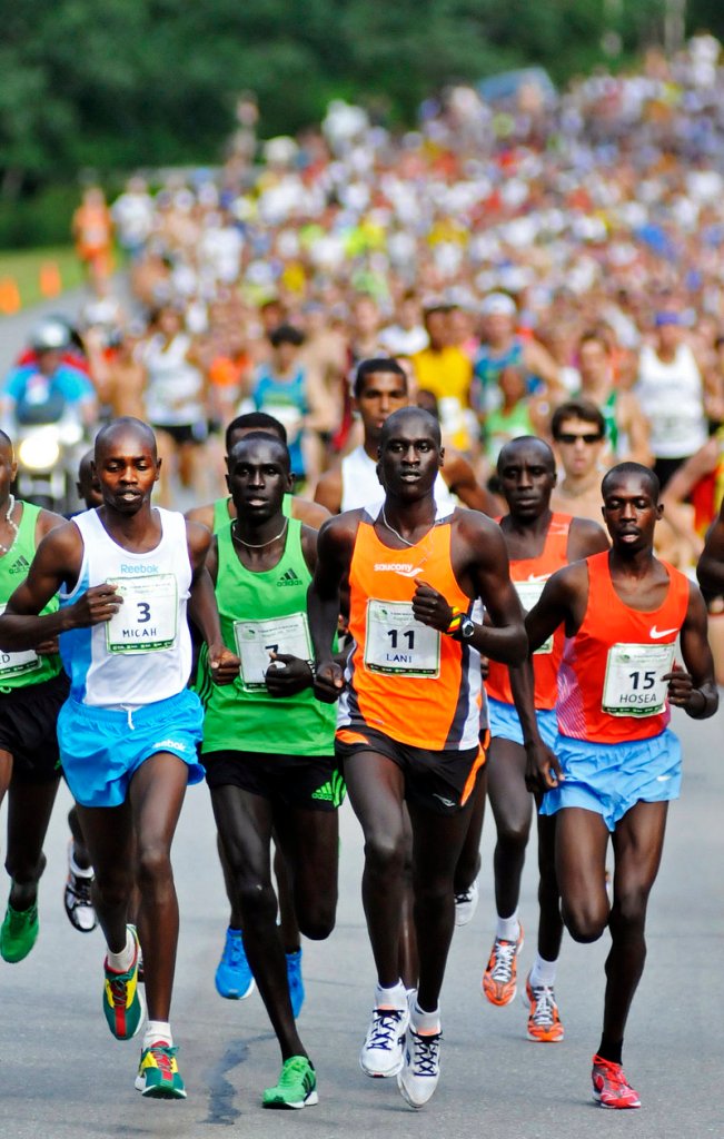 Off they go Saturday, the elite runners in front for the Beach to Beacon 10K in Cape Elizabeth. Included in the lead pack are, from left to right, Micah Kogo (the winner), Lucas Rotich, Lani Rutto and Hosea Mwok-Macharinyang, all of Kenya.