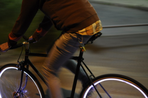 The Aura system, still in development, lights up tires so a bicycle will be more visible from the side. It’s one of many ways to add lights to bikes for safer riding.