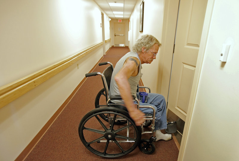 Paul Varieur enters his apartment at Huot House in Saco, a program that helps homeless veterans find and keep jobs and make the transition back into civilian life. Huot House is currently at capacity, with 10 residents ranging from veterans in their 30s to an 81-year-old veteran of World War II.